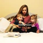 mom and children reading in bed kids to read