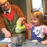 little girl cooking with grandma love of math