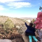 girls looking over hill teachable moments