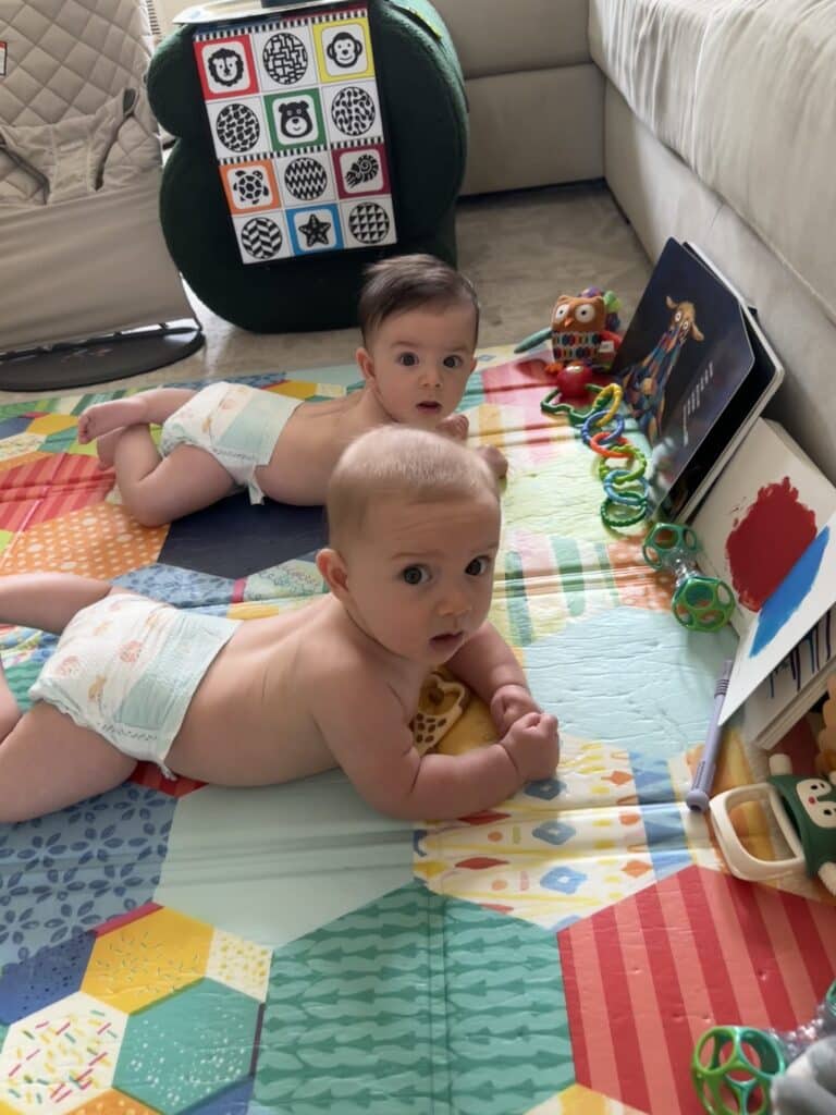 4 month old twins playing