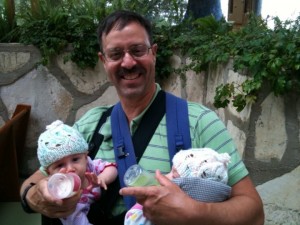 Tim with 1 in front Bjorn and 1 in front Snugli babywearing twins