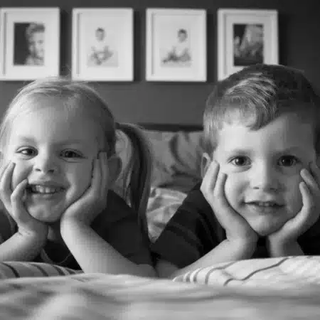 when do twins start talking